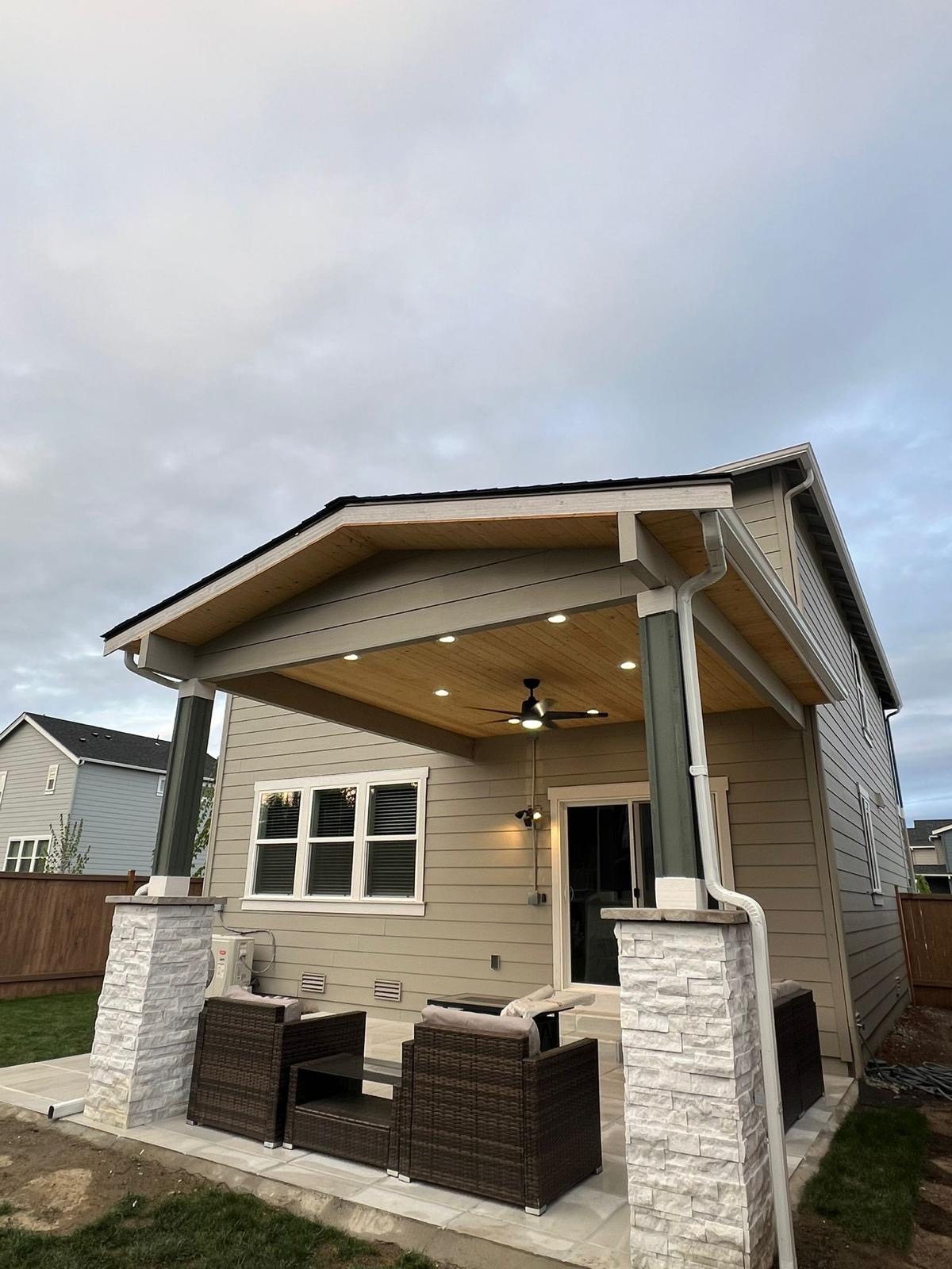 Exterior finishing with lighting, steps, and handrails on Seattle home remodel